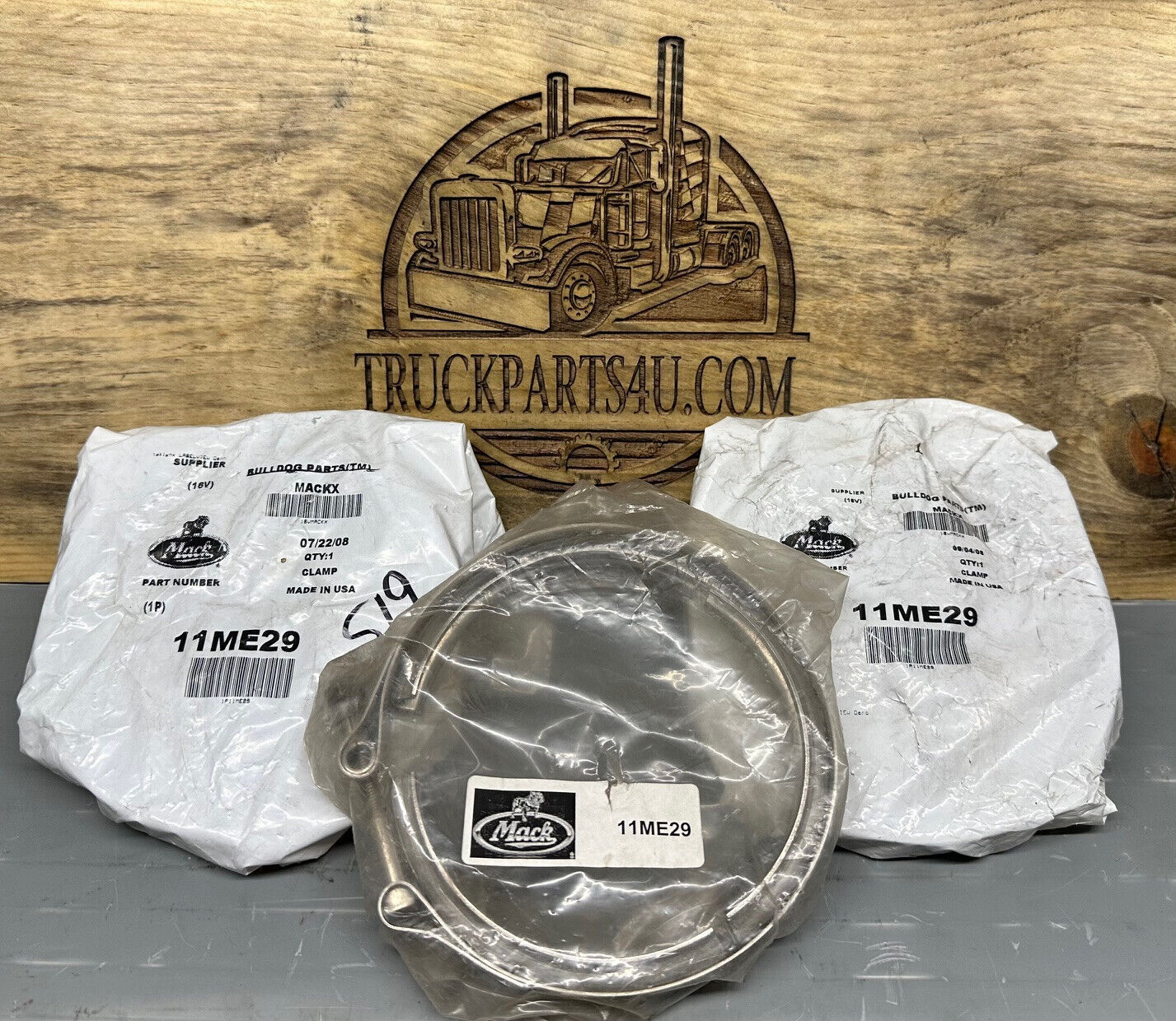 Front view of 11ME29 Mack V-band clamp – genuine OEM 4" exhaust band